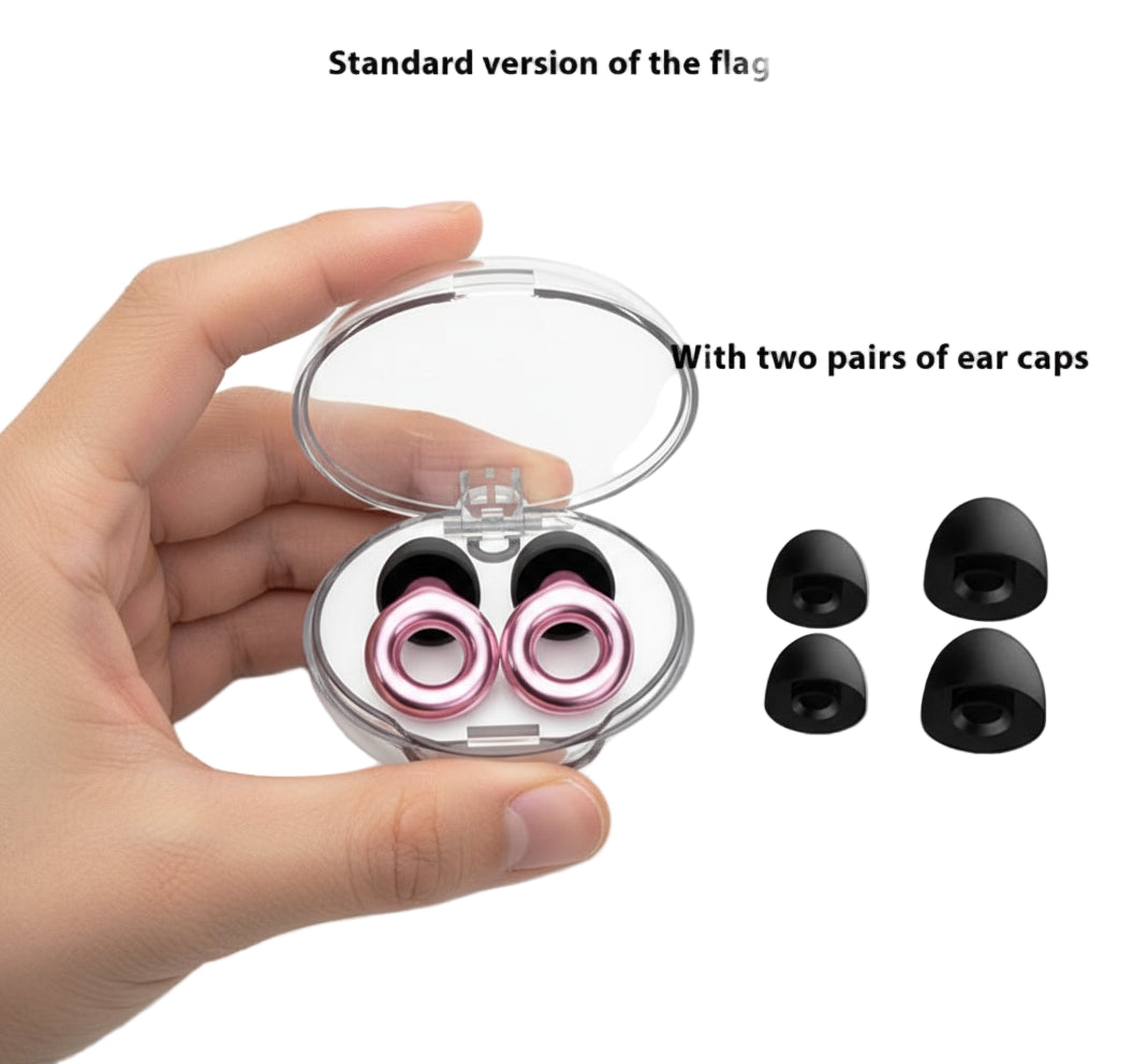 Pink earbuds in a clear case with two pairs of black ear caps on a white background.